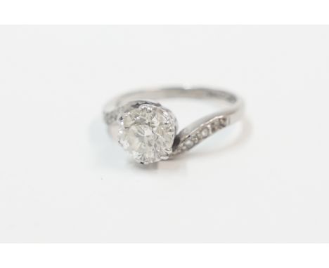 18ct white gold platinum set single stone Diamond ring, approx. 1.50ct, with Diamond set twist shoulders. Size K/L. Total ite