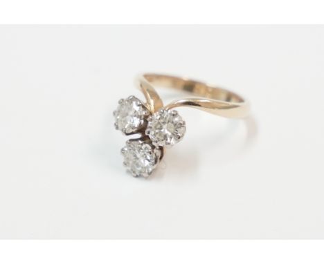 18ct yellow and white gold ring, set with 3 round brilliant cut Diamonds, approx. 2.00ct total weight. Size L/M.Total item we