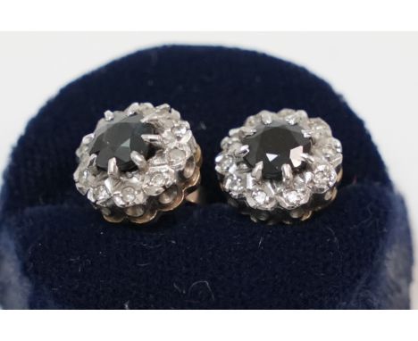 Pair of 9ct Sapphire and Diamond cluster earrings.Total item weight approx 3.83 grams.