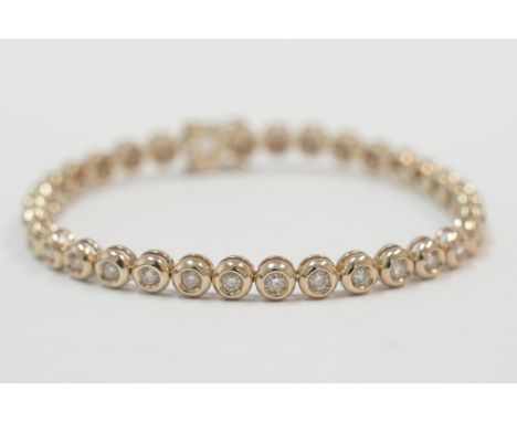 18ct yellow gold bracelet, set with 34 round Diamonds, approx. 1.70cts total weight. Total item weight approximately 17.39 gr