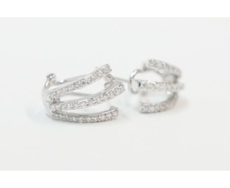 18ct white gold 3 row Diamond set half hoop earrings.Total item weight approximately 5.13 grams.