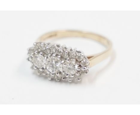 18ct yellow and white gold cluster ring, set with 3 centre round Diamonds, approx. 0.55ct total weight, surrounded by further