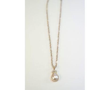 9ct yellow gold pear shaped Mabe pearl pendant, with 3 round brilliant cut Diamonds, on 9ct long and short link belcher style