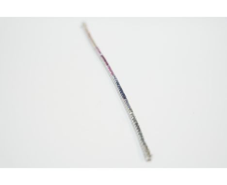 18ct white gold multi Sapphire line bracelet.&nbsp; Total item weight approximately 17.27 grams