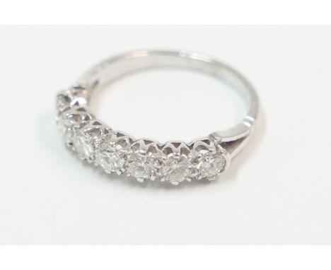 18ct white gold 7 stone Diamond half eternity ring, approx. 0.70cts. Size L. Total item weight approximately 2.96 grams.