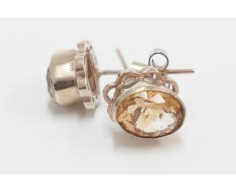Pair of 9ct yellow gold Citrine set stud earrings. Total item weight  approximately 3.32 grams.