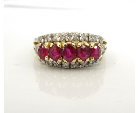 RUBY AND DIAMOND CLUSTER DRESS RINGthe six central oval cut rubies in diamond surround, on fourteen carat gold shank, ring si