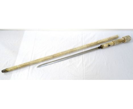 DECORATIVELY CASED EARLY VICTORIAN SWORDSTICKthe carved bone pommel and grip with woven effect detail, this section also bear