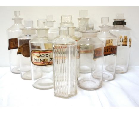 SELECTION OF TEN VINTAGE CHEMIST BOTTLESsome with shaped tablet stoppers, three bearing content labels with gilded borders, f