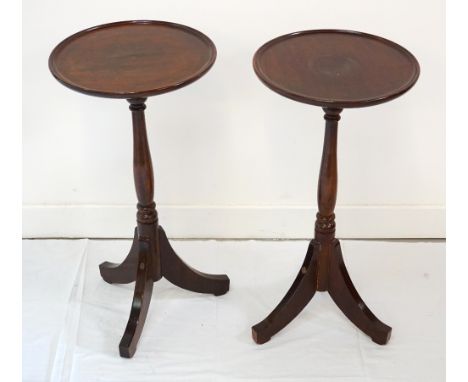 PAIR OF MAHOGANY WINE TABLESwith circular tops and pedestals raised on tripod supports, 63cm high