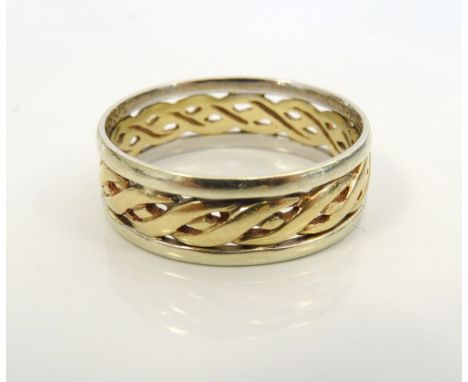 ATTRACTIVE TWO TONE NINE CARAT GOLD WEDDING BANDwith central entwined pierced band, ring size T-U, approximately 3.5 grams