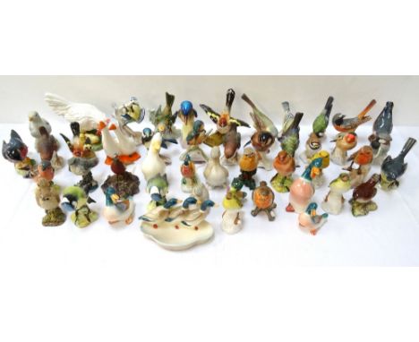 COLLECTION OF BIRD ORNAMENTSby Beswick, Goebel, Crown Staffordshire, Royal Worcester, Royal Doulton and others, with examples