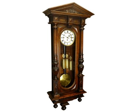 19th century walnut Vienna type wall clock, Architectural case with angular pediment and fluted columns, triple train Grand S