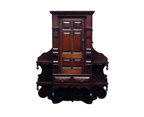 Edwardian walnut architectural wall cabinet, moulded cornice with dentil frieze and  fielded six panel miniature door, above 