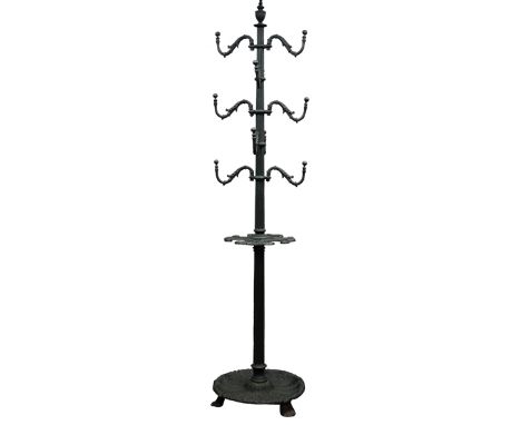 Cast iron hat and coat stand, with ten scroll branches and stick divisions on fluted column with urn finial, leaf scroll cast