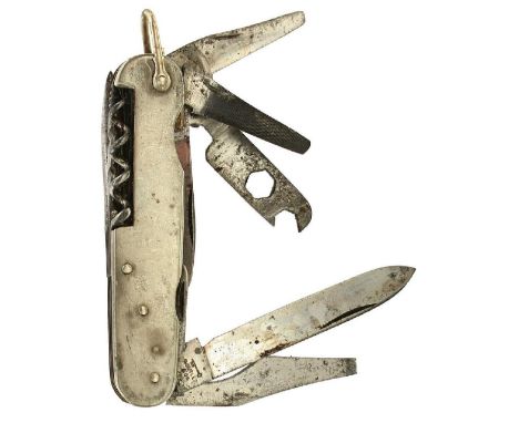 A RARE BUTLER &amp; CO. MULTI-TOOL POCKET KNIFE, the 10 bladed implement with open and closed spanner arm.