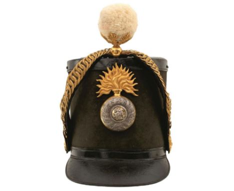A NORTHUMBERLAND FUSILIERS ALBERT PATTERN SHAKO, the black body with patent leather front and rear peaks and top, applied wit