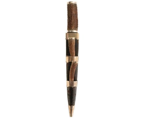 A LATE 19TH CENTURY HUNTING DAY DIRK, 26.5cm flattened diamond section fullered blade, white metal mounted stag's horn hilt, 