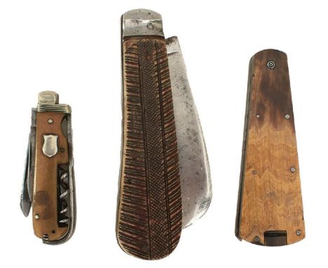 THREE VARIOUS FOLDING KNIVES, comprising a Joseph Rodgers &amp; Sons knife containing two fleams or bloodletting blades, and 