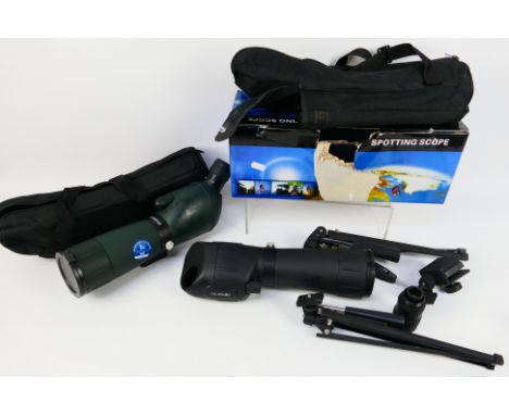 A Zennox spotting scope in carry case with tripod and one other with tripod in original box. [2]. [W]