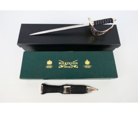 A boxed Wilkinson Sword sgian dubh and a boxed miniature sword. [W]

Note: This lot is not for sale to people under the age o