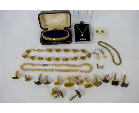 Costume jewellery to include a gold plated bracelet, stone set pendant with necklace, cufflinks, pearl bead necklace and othe