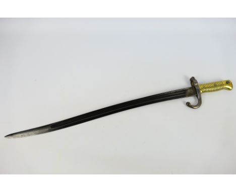 A French M. 1866 bayonet, 57 cm (l) blade, approximately 69 cm (l) overall. [W]

Note: This lot is not for sale to people und