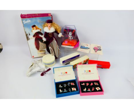 Lot to include a boxed Mattel Barbie Victorian Ice Skater, a small quantity of truck trailer models, pin badge sets and other