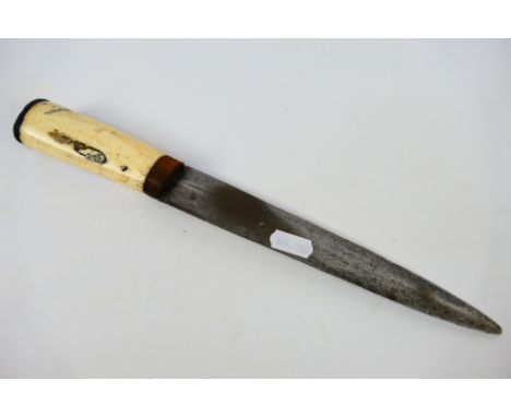 A bone handled dagger with 21 cm (l) blade. [W]

Note: This lot is not for sale to people under the age of 18. By bidding on 