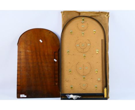 Two vintage wooden games boards comprising Bagatelle and Shove ha'penny. [2]. [W]