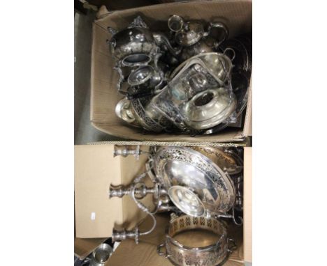 Two boxes of vintage silver plate to include candelabra, teapots etc