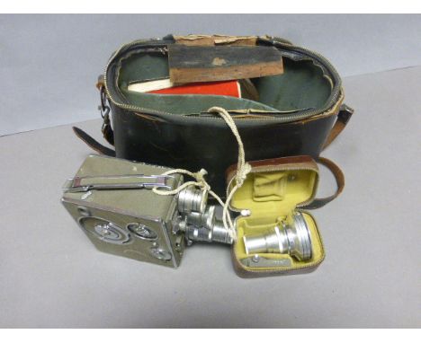 A cased vintage Nizo cine camera with accessories .