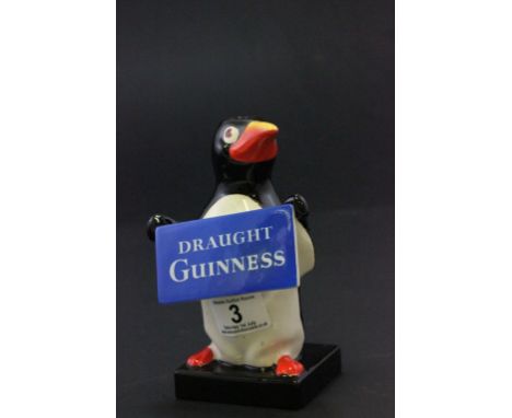 Guinness Carltonware Penguin lamp base holding Draught Guinness plaque
