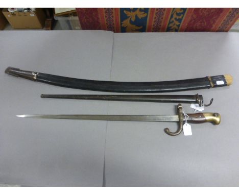 French St Etienne production bayonet with scabbard, dated 1879 plus a vintage sword scabbard