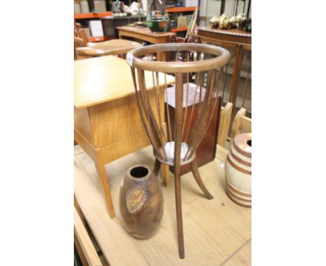 Wooden plant stand on tripod feet plus a carved wooden vase