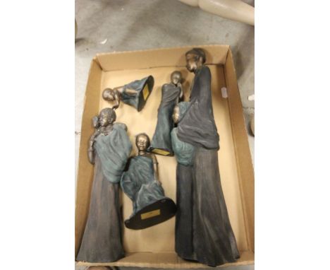 Five Soul Journeys African Figurines plus a Ceramic model of a Man fishing 