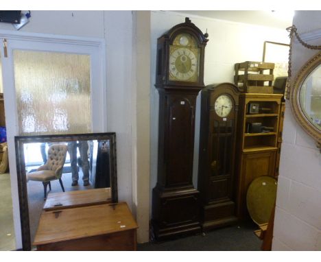 A 19th century mahogany  longcase clock with two train movement  with silvered dial  above which is a similar plaque inscribe