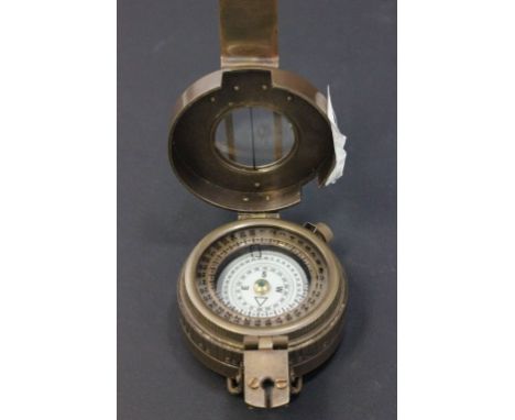 Brass compass stamped TG & Co London 1940 with crows foot mark