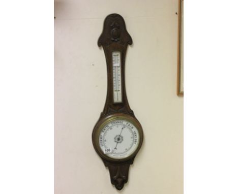 Arts & Crafts style carved wooden Aneroid Barometer