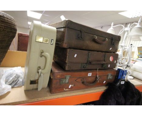 Three vintage leather suitcases, plus one other