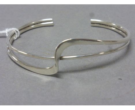 Silver cuff bangle with wave design