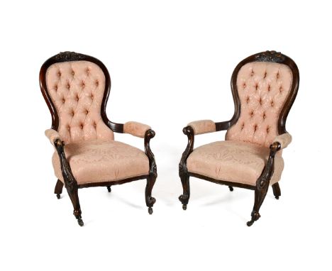 Pair of mid-Victorian carved oak button back bedroom chairs. Having pink floral upholstery cabriole supports to the front ter