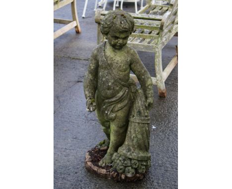 A composition stone garden figural sculpture. Modelled as a young boy holding a bouquet of lowers, 101cm high