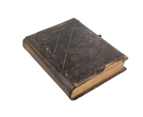 A Victorian musical photograph album. 'The Regina Album', bound in black leather with gilt floral and bird decoration, the in