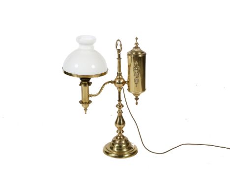 A large antique, early 20th century, brass lamp student oil lamp. Fitted for electricity, with opaque white glass shade, stan