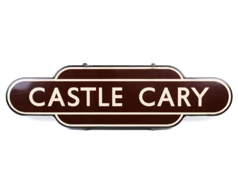 A British Rail BR 1960s 'Castle Cary' enamel railway station totem sign. Brown with white enamel lettering and borders, L92.5