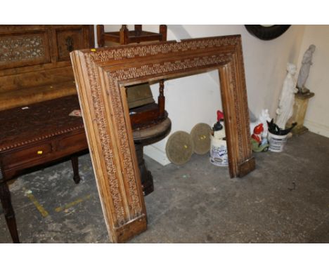 AN ANTIQUE FIRE SURROUND