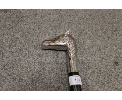 A HORSE HEAD HANDLED WALKING STICK