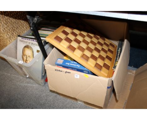 A BOX OF BOARD GAMES TO INCLUDE A WOODEN CHESS BOARD