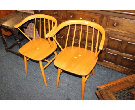 A PAIR OF ERCOL STYLE ARMCHAIRS